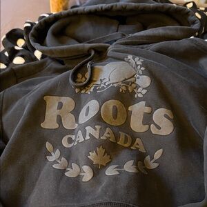 Roots Black Fleece with Green Label